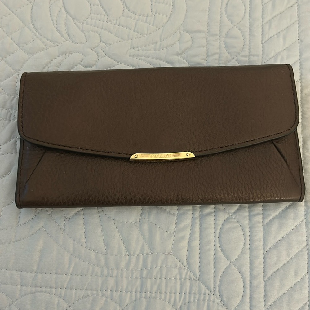 NWT Coach wallet. Pebbled leather with gold tone hardware.
